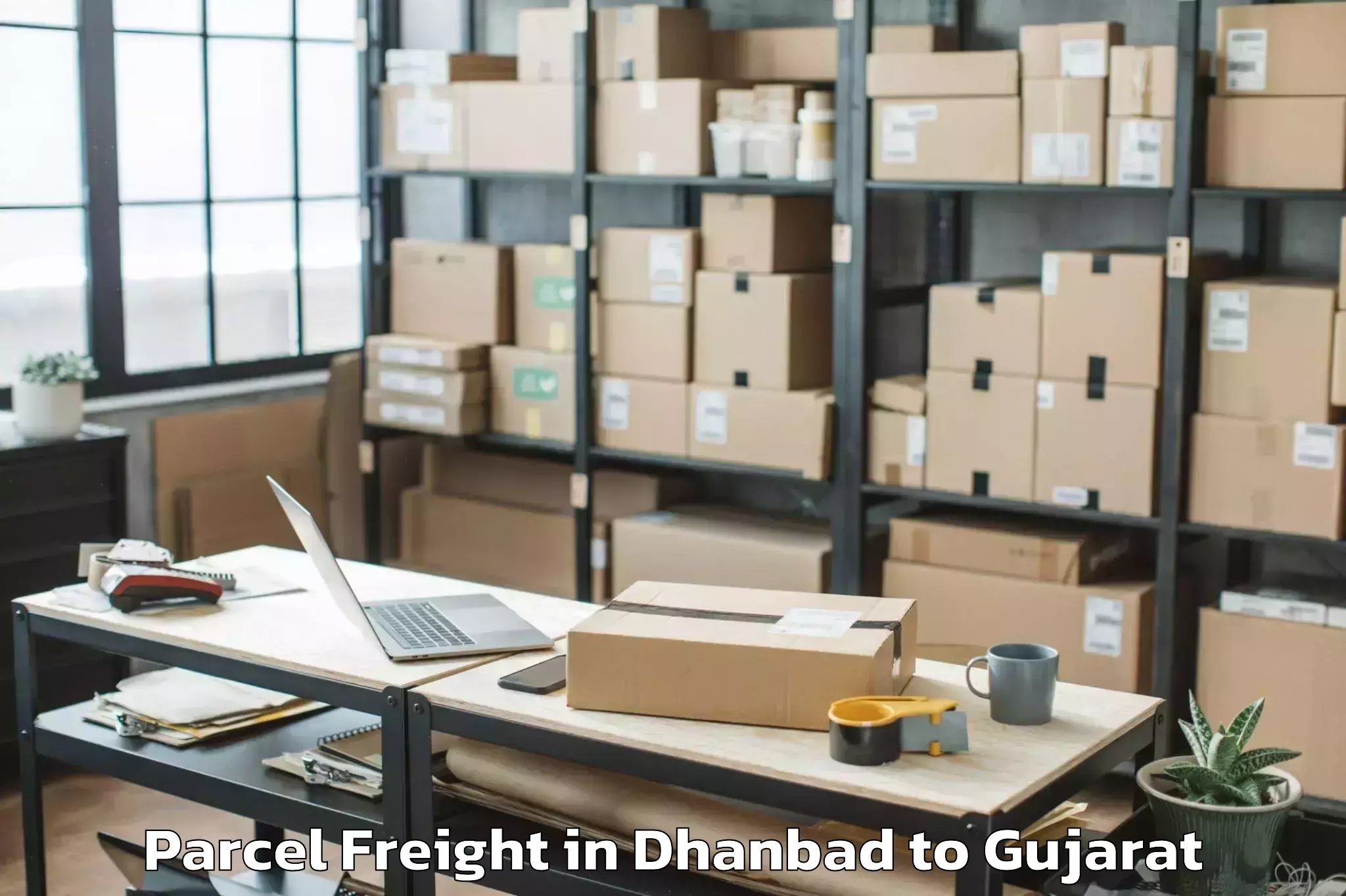 Leading Dhanbad to Madhavkampa Parcel Freight Provider